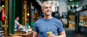 healthy man having a smoothie