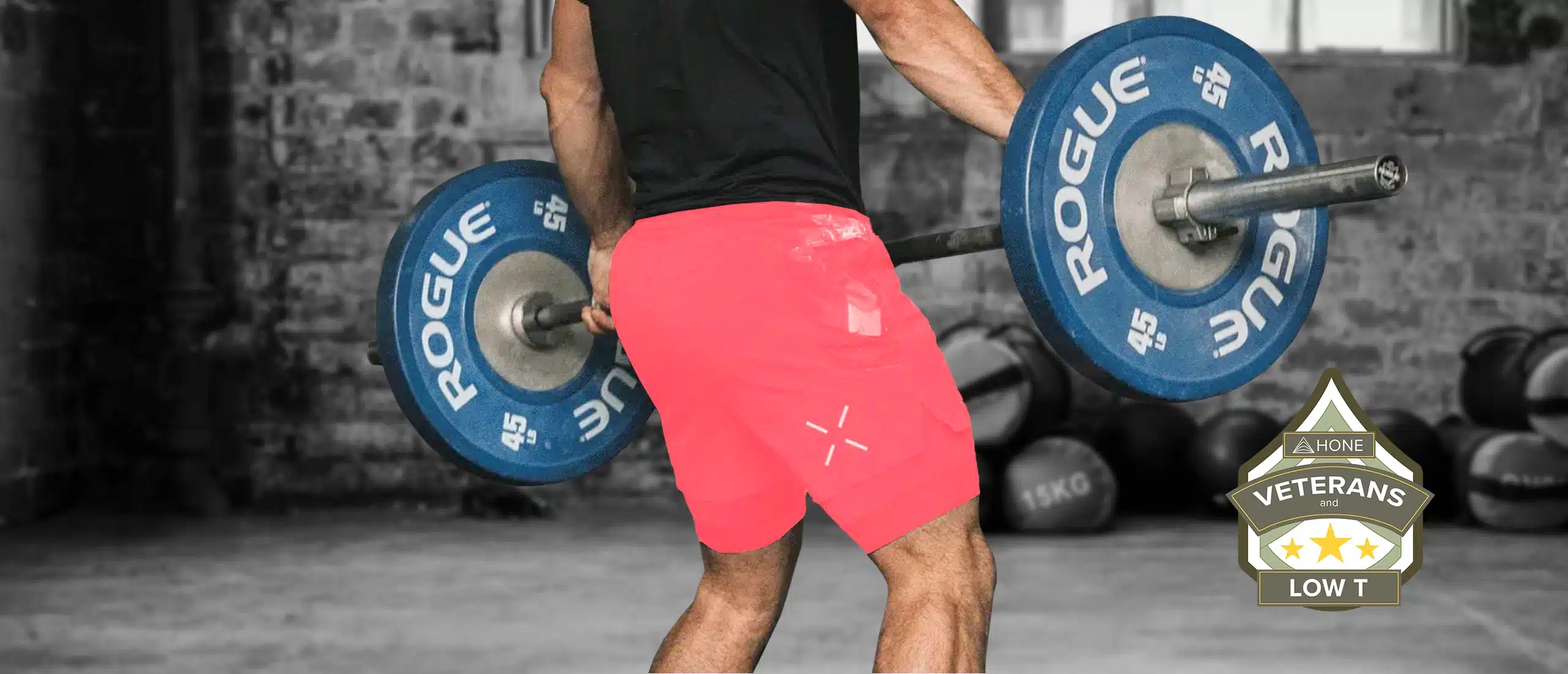 Man doing hand cleans in ten thousand interval shorts