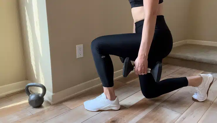 Woman doing lunges in the Reebok Nano X2 shoes. 