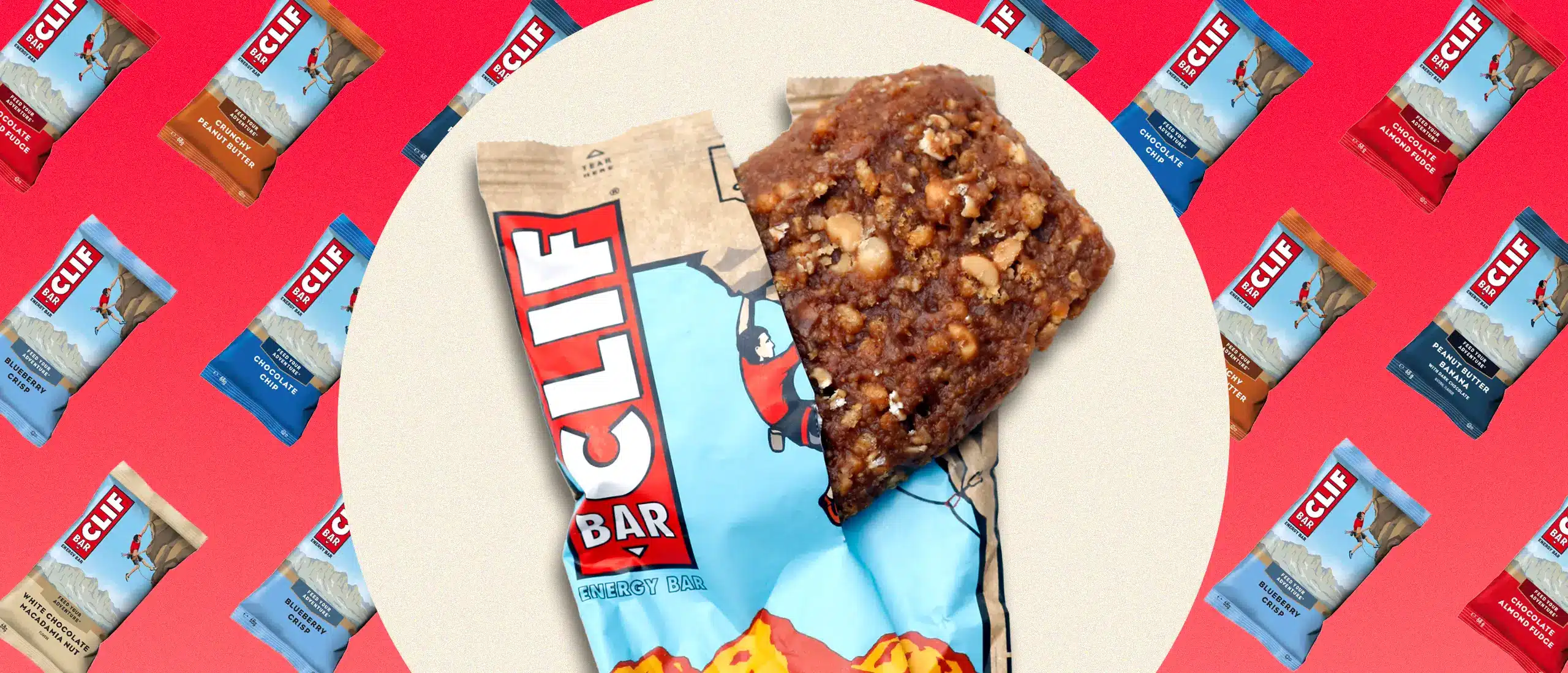 An open clif bar with more clif bars in the background