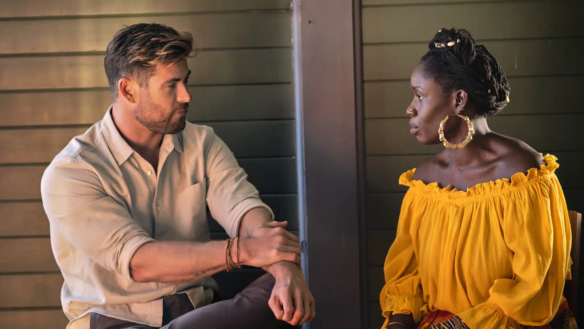 Death doula Alua Arthur talks to Chris Hemsworth in a scene from Limitless