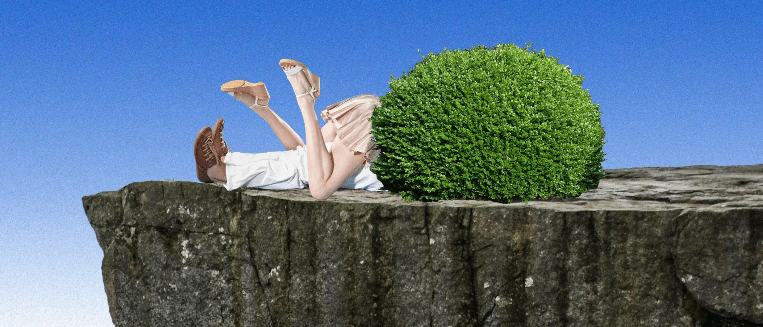 Man and woman's legs sticking out from behind a bush on top of a stump with a blue background