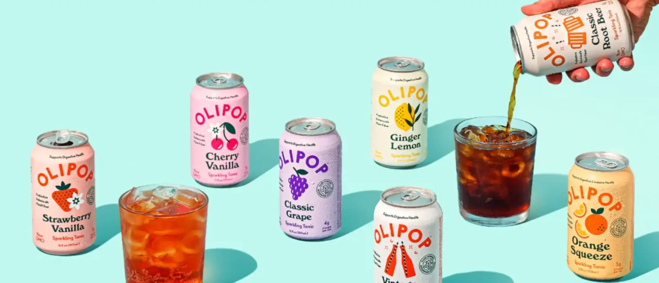 7 different olipop soda cans on a light blue background. Two glasses full of soda sit between the cans
