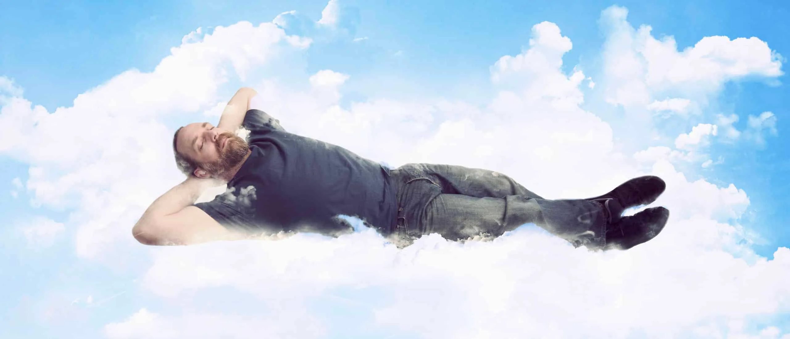 Man floating on a cloud