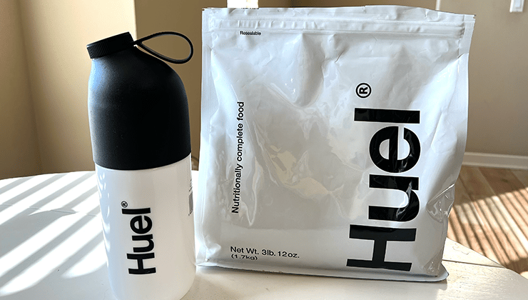 A picture of a Huel Packet and a matching bottle