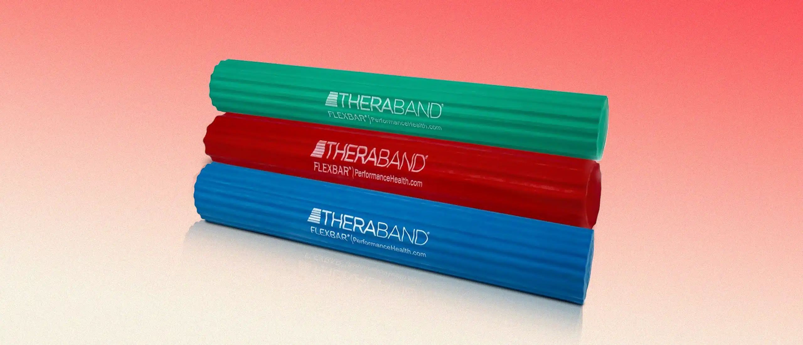 3 Theraband Flexbars on red gradient background