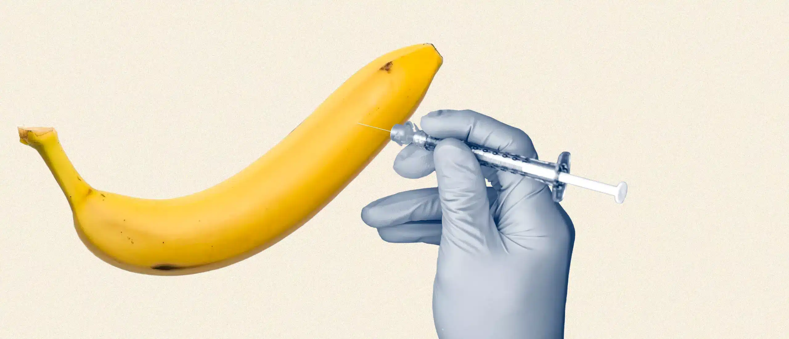 syringe poked into a banana