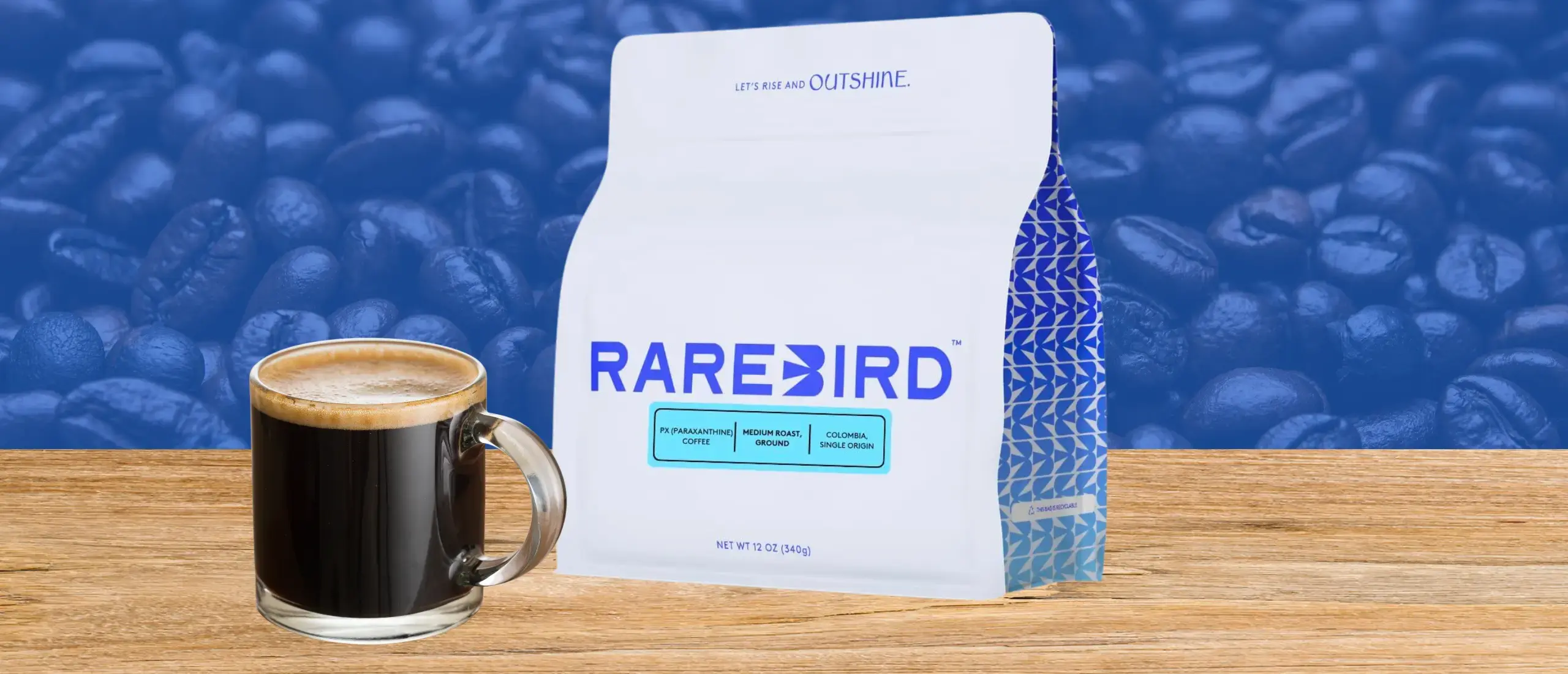 bag of rarebird coffee on a table with a mug next to it