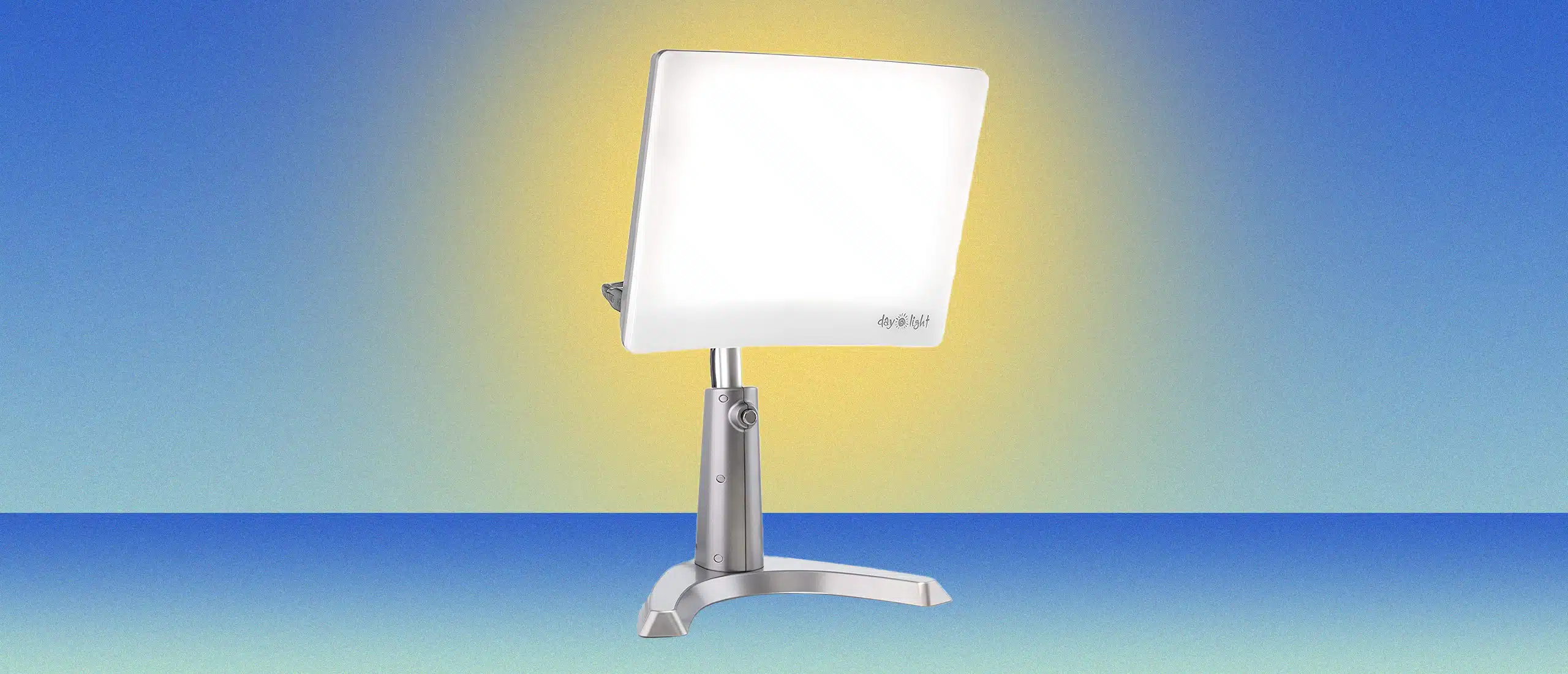 sun light therapy lamp on blueish green background