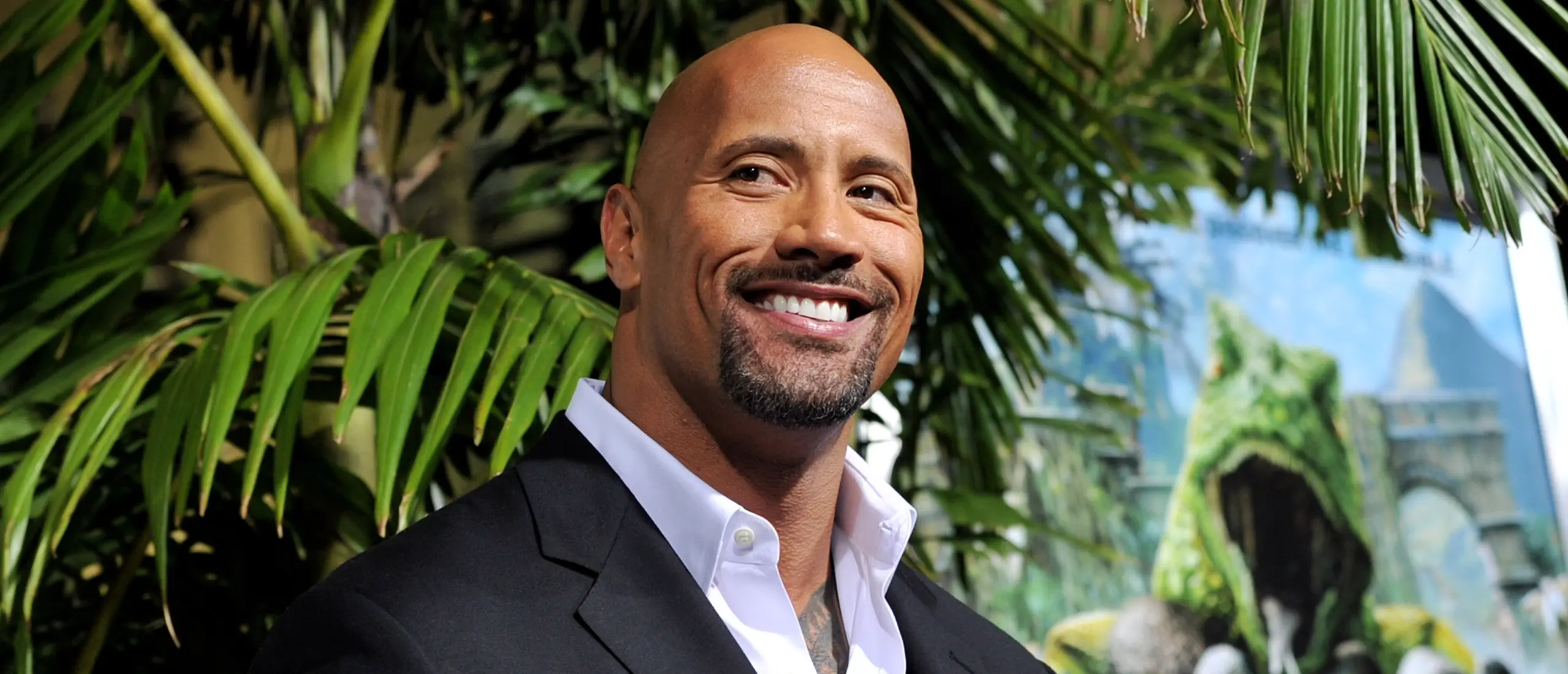 dwayne the rock looking devilishly handsome in a tropical setting