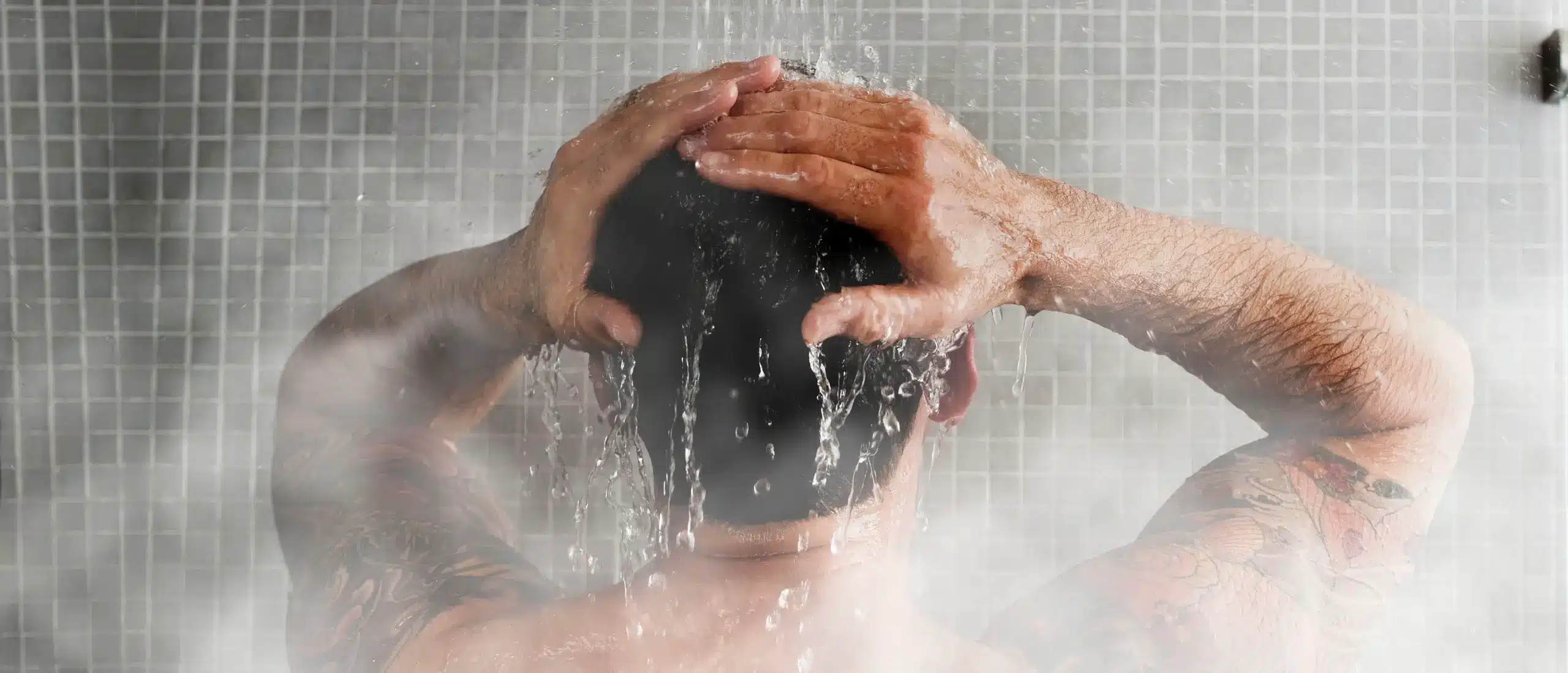 Man taking a hot shower