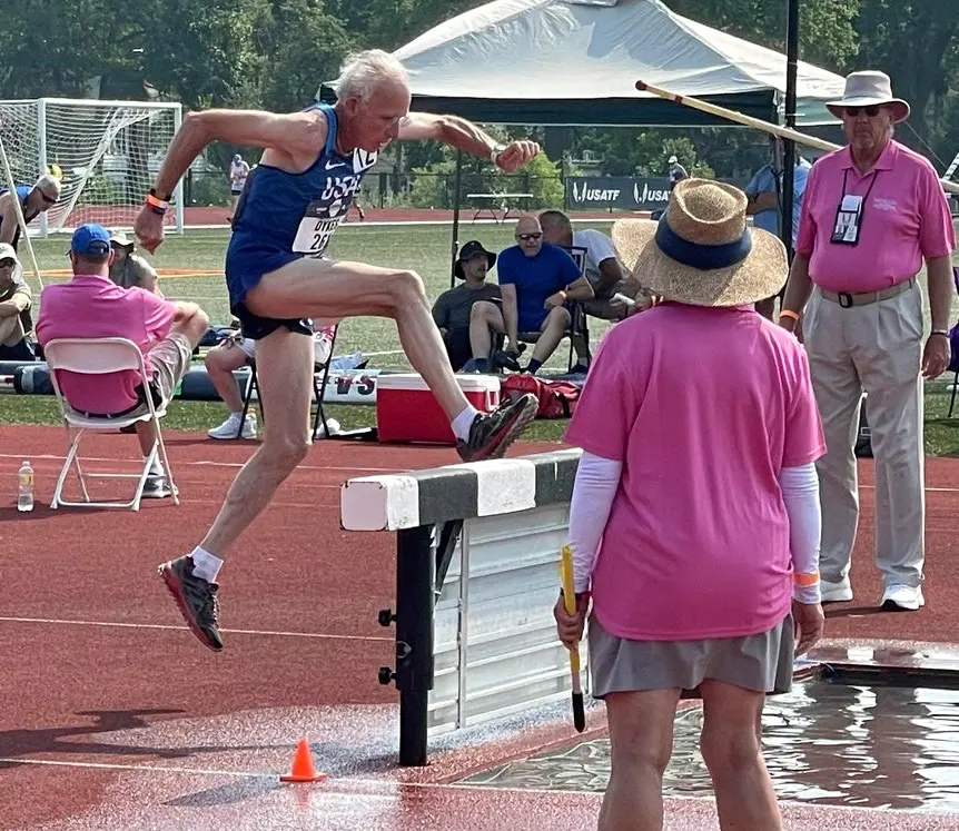 Gene Dykes participating in the USATF Steeplechase.